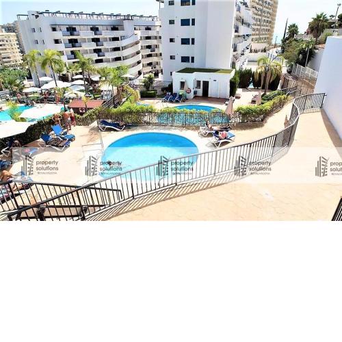 Los Patos Apartamentos. A 300 m de playa. Piscina y Parking. EXCELENTE CONEXION WIFI