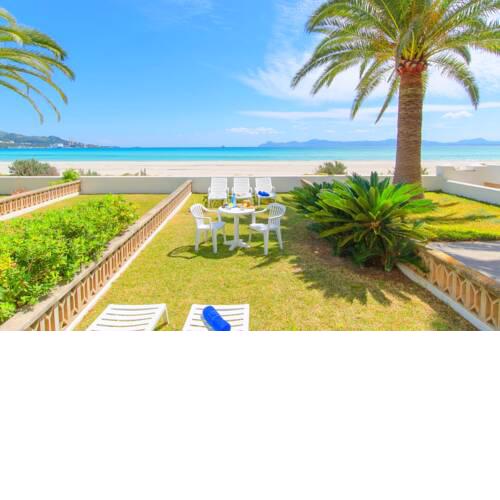 Los Pinos, apartamento con vistas al mar y jardín.