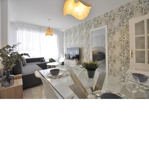 Luminoso y coqueto apartamento con jardín