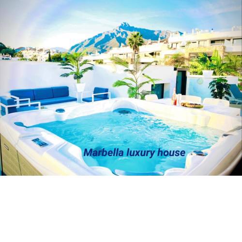 Marbella luxury house with private rooftop Jacuzzi on the Golden Mile