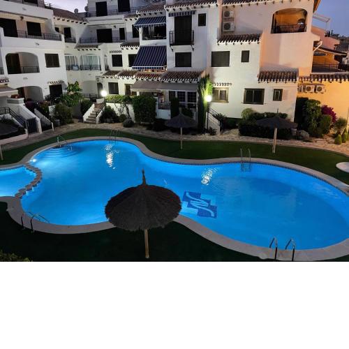 Modern pool view apartment in Cabo Roig