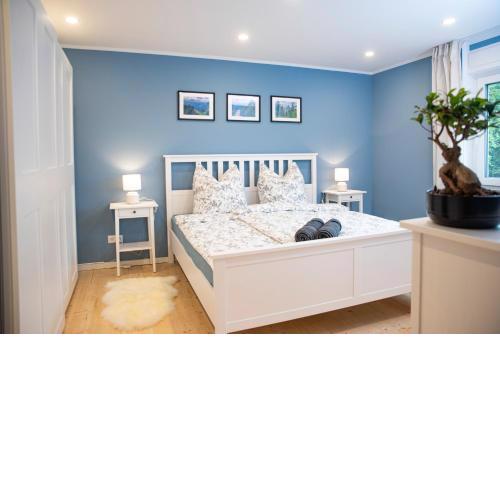 Moderne Wohnung im Grünen mit privatem Garten