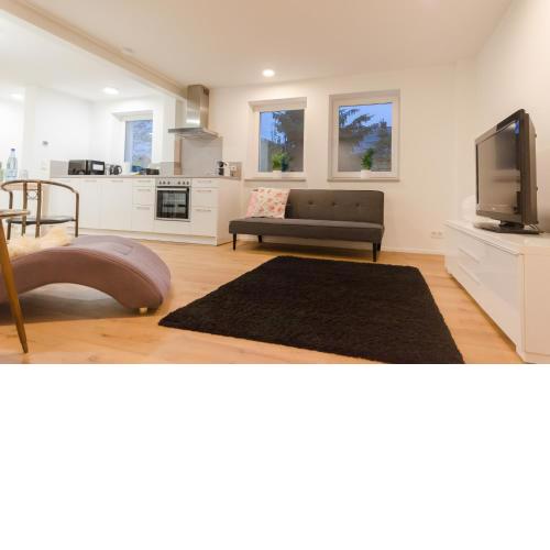 Modernes Apartment mit eigener Terrasse & Garten