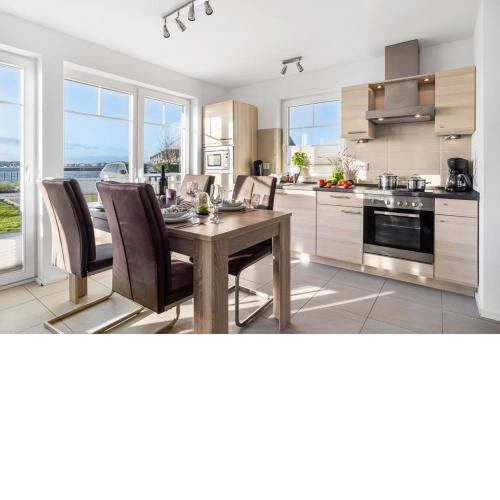 Neu Beach House - Sonnenterasse, Wellnessbad mit Sauna, Kamin, Dachterrasse, Hafenblick