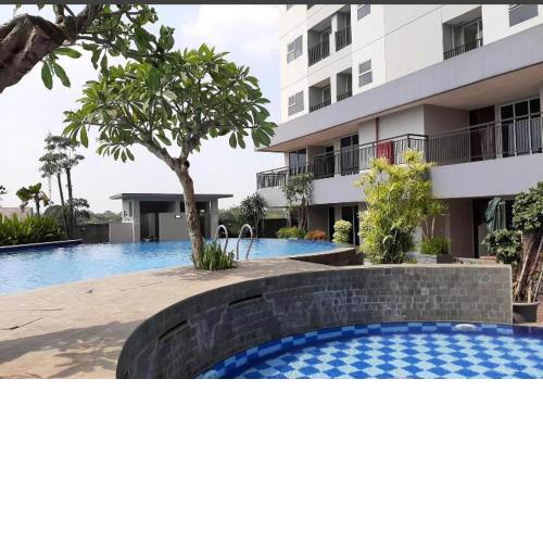 Nice and Cozy Studio at Parkland Avenue Apartment BSD Serpong