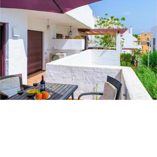 Nice apartment in Marbella with Outdoor swimming pool, Heated swimming pool and 2 Bedrooms