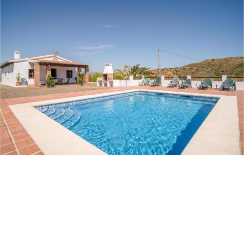 Nice home in Almachar with Outdoor swimming pool, WiFi and 4 Bedrooms