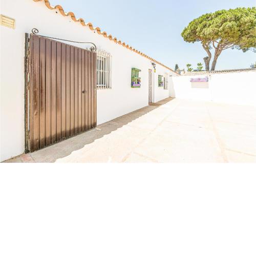 Nice home in Chiclana de la Fronter with Outdoor swimming pool, Swimming pool and 3 Bedrooms