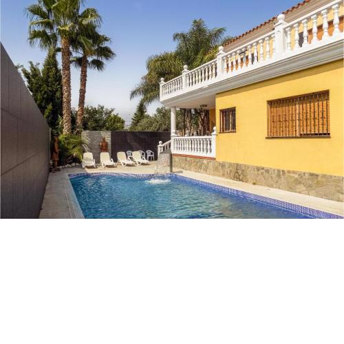 Nice home in Grao with WiFi and 3 Bedrooms