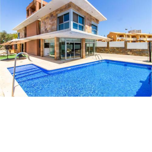 Nice home in La Manga with Outdoor swimming pool, Private swimming pool and 4 Bedrooms