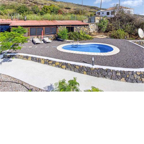 Nice home in Villa Mazo La Palma with Outdoor swimming pool, WiFi and 1 Bedrooms