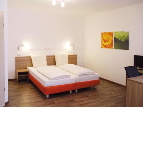 Orange Hotel und Apartments