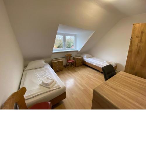 Othman Appartements Groß Buchholzer Straße 1OG