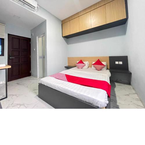 OYO 90527 Homestay 81 Baloi - A