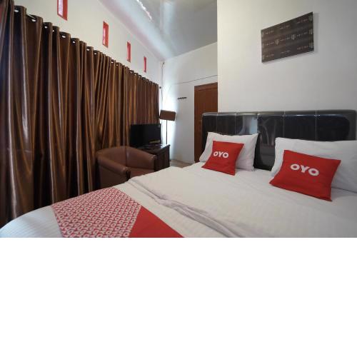 OYO 90645 Karisma Residence