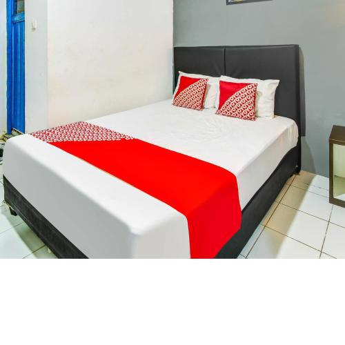 OYO 90906 Guest House Idm Inn