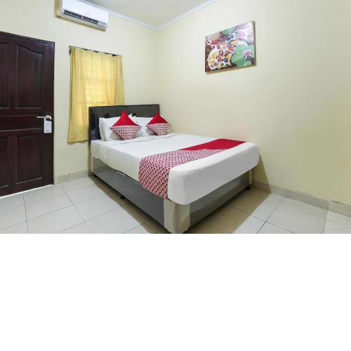 OYO 90907 Handika Jaya Bs