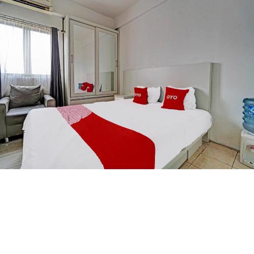 OYO 91880 The Suites Metro