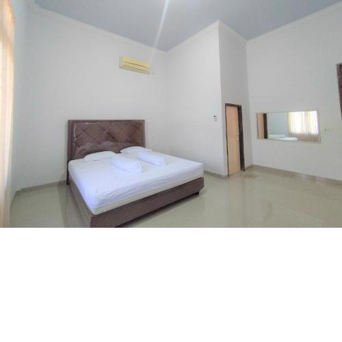 OYO 92808 Kost Nino Telanaipura