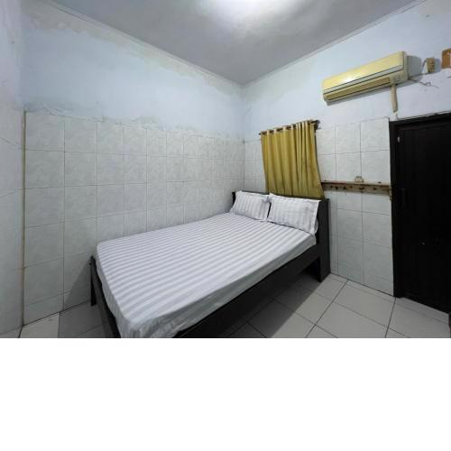 OYO 93137 Kost Maharaja