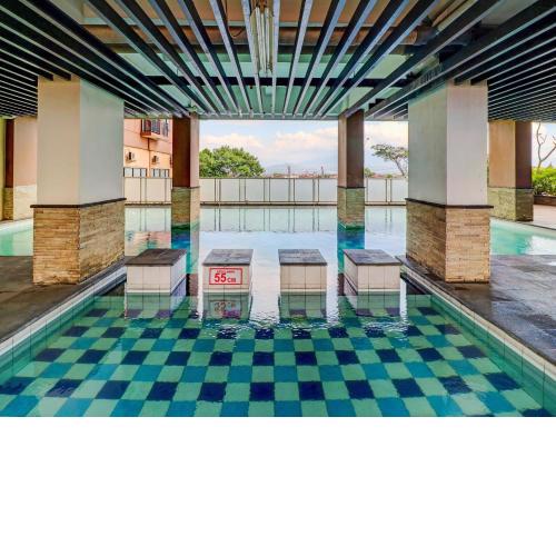 OYO Life 92735 Apartemen Tamansari Panoramic By Santuy