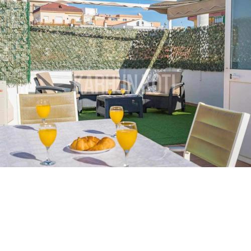 Penthouse in the center and one step from the beach Karhun Koti Rentals