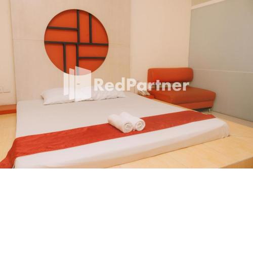Pits Hotel RedPartner near Atom Mall