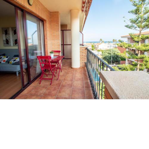 Practico apartamento en la playa de Canet con piscina