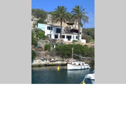 Preciosa casa en primera línea del mar