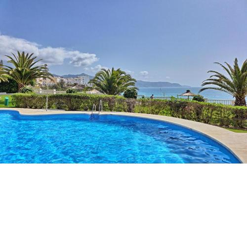 Precioso apartamento con piscina. Playa Torrecilla