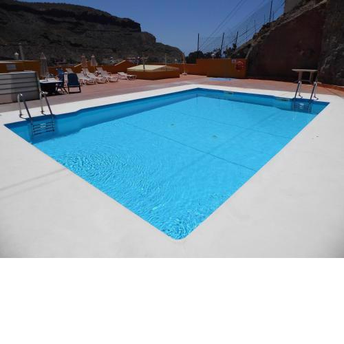 Puerto de Mogan - Spacious, 3 Bedroom apartment. Air Con. Heated Pool, Playa