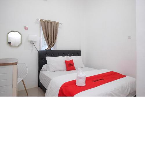RedDoorz Plus At Lovina Inn Tonrangeng River Side