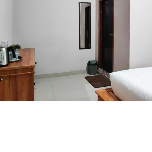 RedDoorz Syariah Near Tugu Macan Kayu Aro