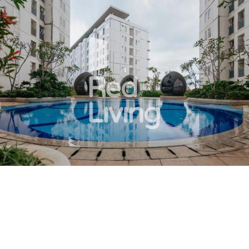 RedLiving Apartemen Bassura City - Vina Tan Tower Flamboyan