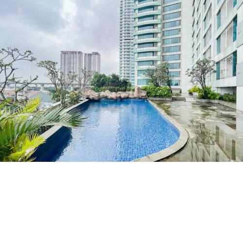 RedLiving Apartemen Grand Kamala Lagoon - Kita Kita Property Tower Emerald