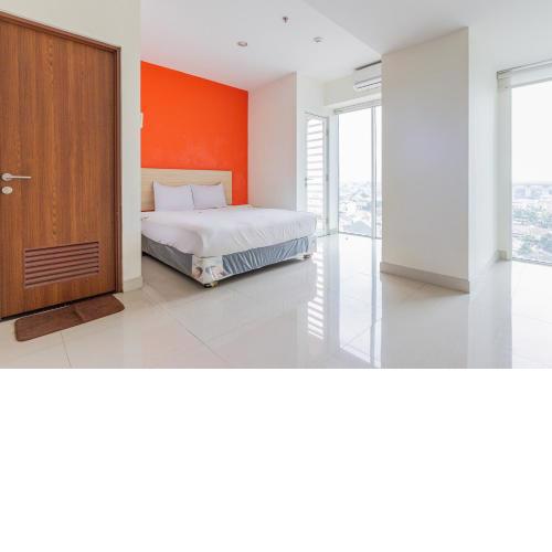 RedLiving Apartemen Grand Kamala Lagoon - Rooms 911 Tower Barclay South with Netflix