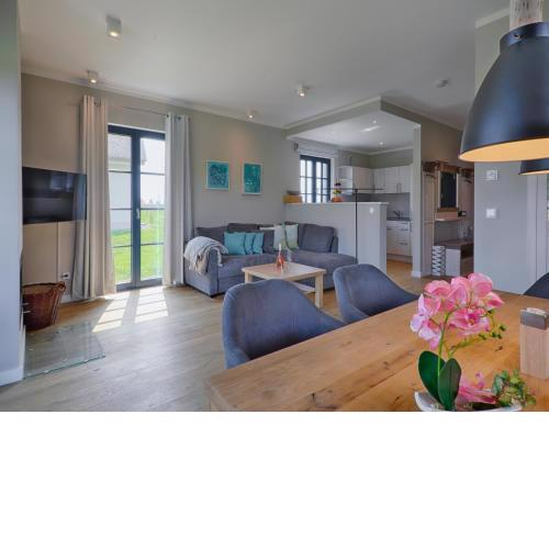 Reetland am Meer - Premium Reetdachvilla mit 3 Schlafzimmern, Sauna und Kamin F28