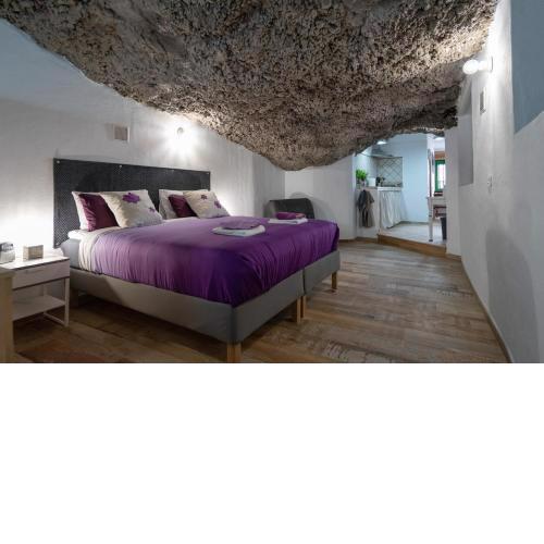 Romantic cave with big terrace overlooking the sea