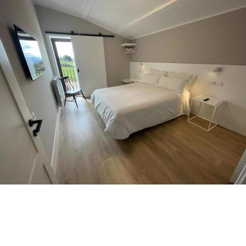 Room in Lodge - Casa Galego rural accommodation on the French road