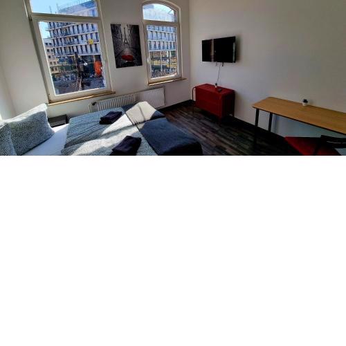 Roter Faden Designer Apartment in der City für 6 Personen, Privatparkplatz kostenlos, Küche, Essbereich