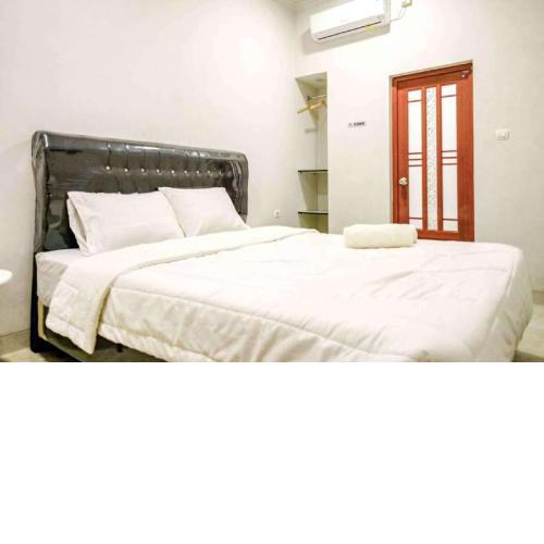 Rudi Rooms RedPartner