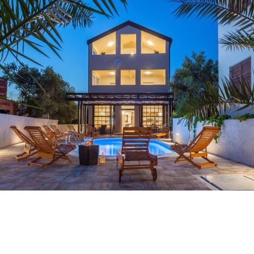 Seaside villa Marin with private heated pool