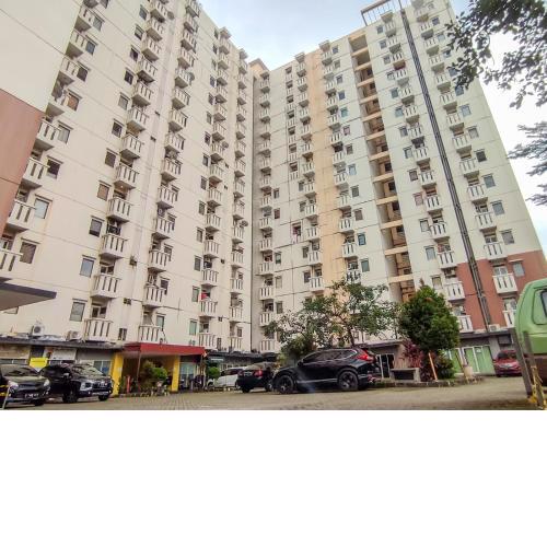 Smile Room at Cibubur Village Apartment