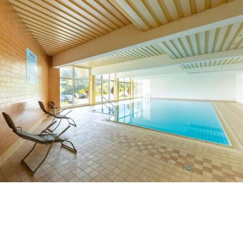 Snug apartment in Zell am See with a shared swimming pool