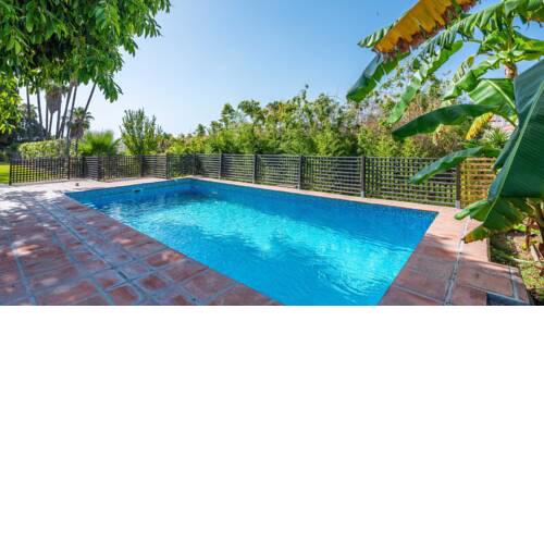 Spacious holiday home fifteen km from Malaga city sleeps twelve