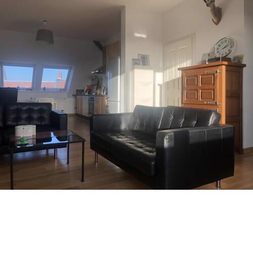 Spacious top floor apartment with sunny balcony.