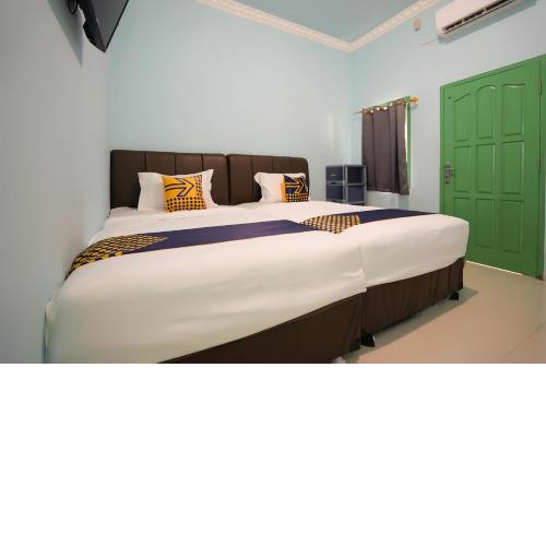 SPOT ON 2738 818 Home Stay