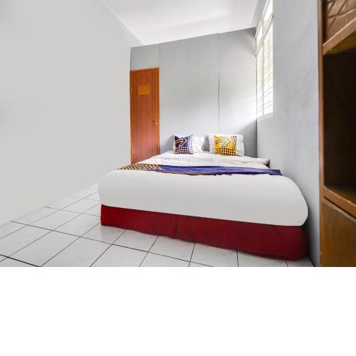 SPOT ON 91393 Budiluhur 10 Homestay