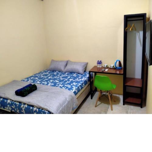SPOT ON 91402 Home'59 Tegal Danas