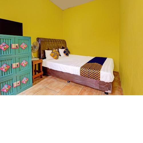 SPOT ON 91478 Wisma Aura Syariah
